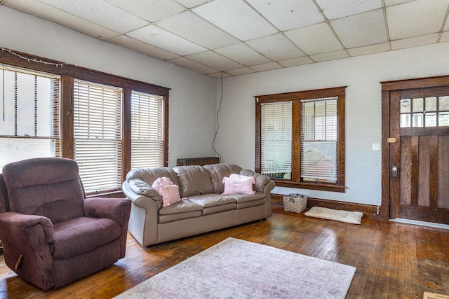 863 Jackson St, Oshkosh, WI 54901 - living room with wood-type flooring and a drop ceiling