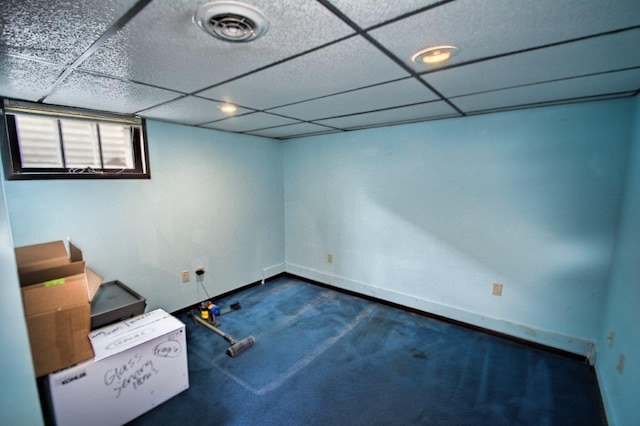 621 N Linwood Ave, Appleton, WI 54914 - spare room with dark colored carpet and a paneled ceiling