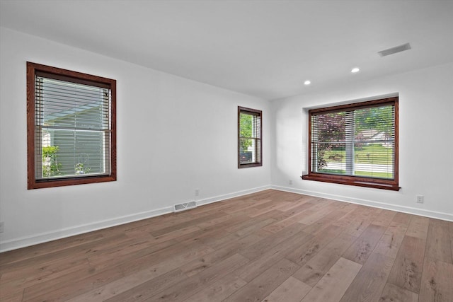 6834 S 35th St, Franklin, WI 53132 - empty room with hardwood / wood-style flooring and recessed lighting