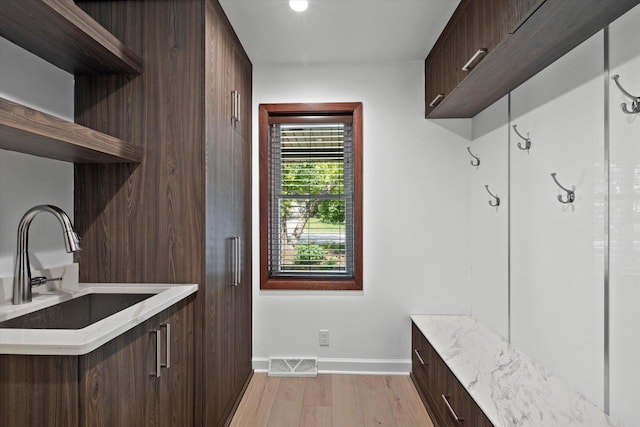6834 S 35th St, Franklin, WI 53132 - mudroom with light wood-style floors and recessed lighting