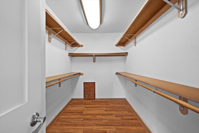 6834 S 35th St, Franklin, WI 53132 - walk in closet featuring wood finished floors