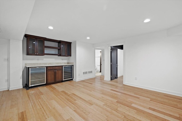 6834 S 35th St, Franklin, WI 53132 - indoor wet bar featuring wine cooler, light wood-style floors, and recessed lighting