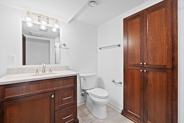 6834 S 35th St, Franklin, WI 53132 - bathroom with vanity and toilet