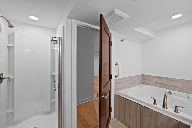 6834 S 35th St, Franklin, WI 53132 - full bathroom featuring a shower stall and a garden tub