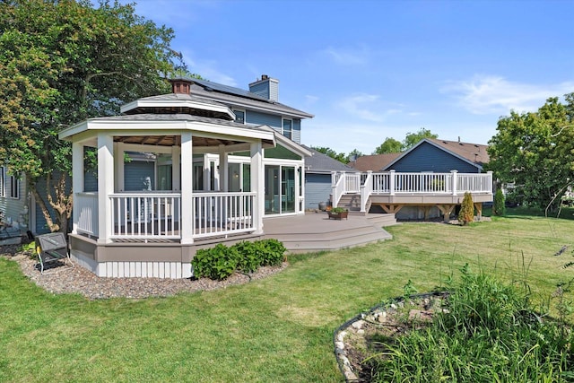 6834 S 35th St, Franklin, WI 53132 - back of house with a gazebo, a chimney, a yard, and a wooden deck