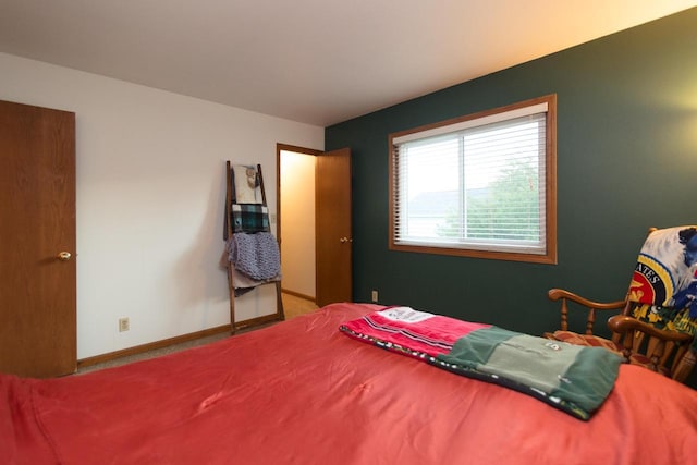 123 Westgate Dr, Iron Ridge, WI 53035 - bedroom with carpet flooring and baseboards