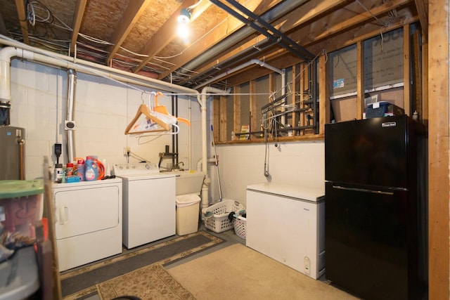 123 Westgate Dr, Iron Ridge, WI 53035 - unfinished basement with freestanding refrigerator, washing machine and clothes dryer, and white fridge