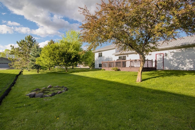 123 Westgate Dr, Iron Ridge, WI 53035 - view of grassy yard featuring a wooden deck