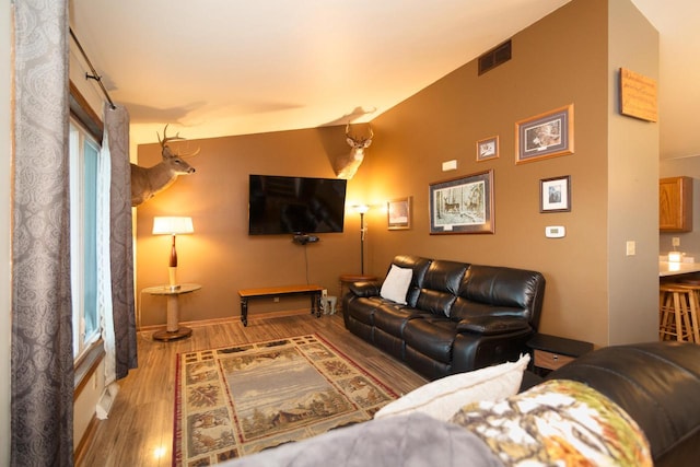 123 Westgate Dr, Iron Ridge, WI 53035 - living room with wood finished floors and vaulted ceiling