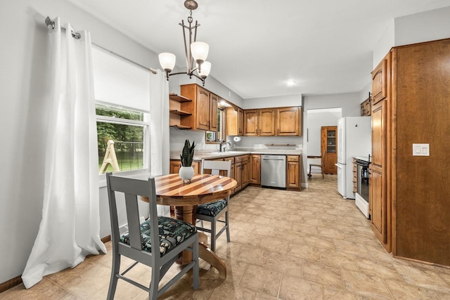 2311 Maplewood Dr, Plover, WI 54467 - kitchen featuring stainless steel dishwasher, brown cabinets, light countertops, range, and open shelves