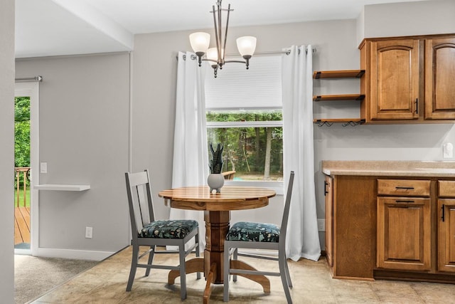 2311 Maplewood Dr, Plover, WI 54467 - dining area featuring healthy amount of natural light and a chandelier