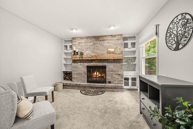 2311 Maplewood Dr, Plover, WI 54467 - living area featuring light colored carpet and a brick fireplace