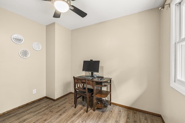 2311 Maplewood Dr, Plover, WI 54467 - office space featuring wood finished floors and ceiling fan