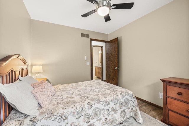2311 Maplewood Dr, Plover, WI 54467 - bedroom featuring wood finished floors and ceiling fan