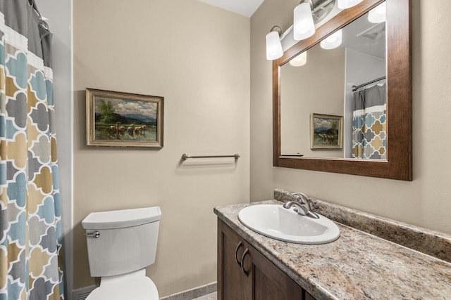2311 Maplewood Dr, Plover, WI 54467 - full bathroom featuring vanity and toilet