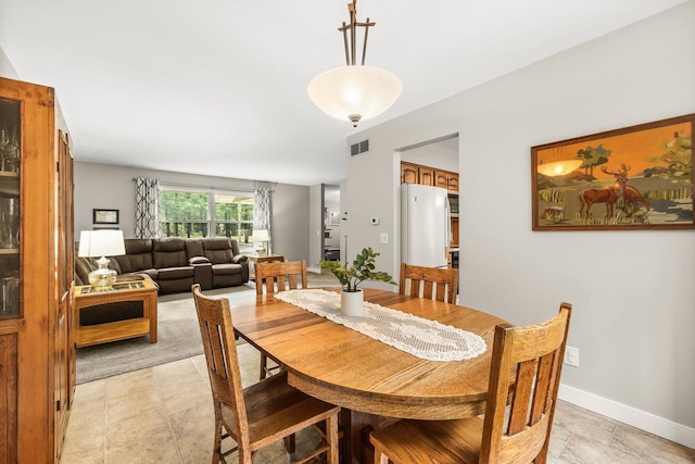 2311 Maplewood Dr, Plover, WI 54467 - dining area featuring baseboards