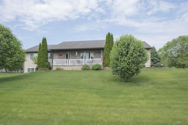 708 Owl Ln, Stevens Point, WI 54482 - ranch-style home with a front yard and a porch