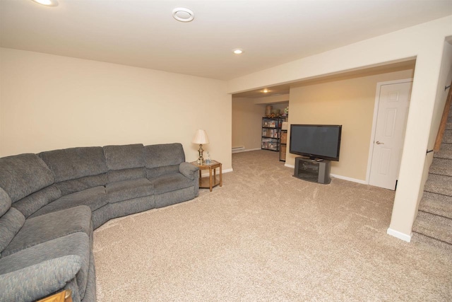 708 Owl Ln, Stevens Point, WI 54482 - carpeted living area featuring recessed lighting, baseboard heating, and stairs