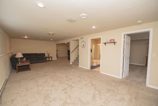 708 Owl Ln, Stevens Point, WI 54482 - living room with carpet, stairs, recessed lighting, and baseboard heating