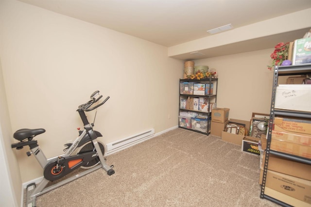 708 Owl Ln, Stevens Point, WI 54482 - exercise room with a baseboard radiator and carpet floors
