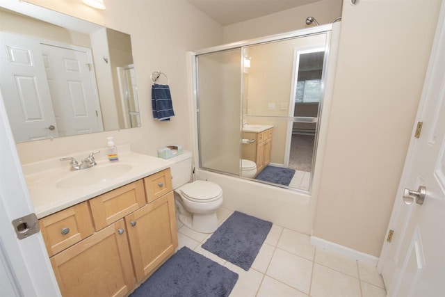 708 Owl Ln, Stevens Point, WI 54482 - bathroom featuring vanity, tile patterned floors, and combined bath / shower with glass door