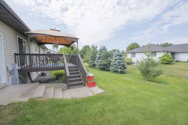 708 Owl Ln, Stevens Point, WI 54482 - view of grassy yard featuring a gazebo, stairs, and a deck