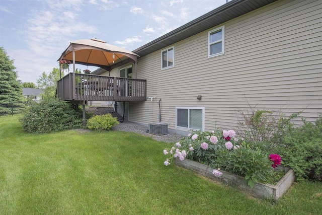 708 Owl Ln, Stevens Point, WI 54482 - rear view of house with a gazebo, a yard, and a wooden deck