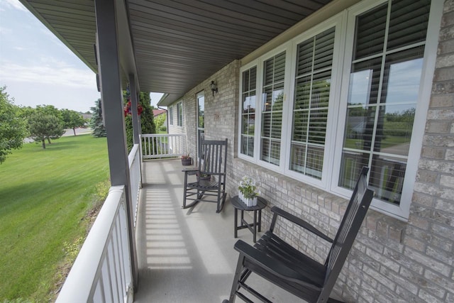 708 Owl Ln, Stevens Point, WI 54482 - covered porch with a lawn