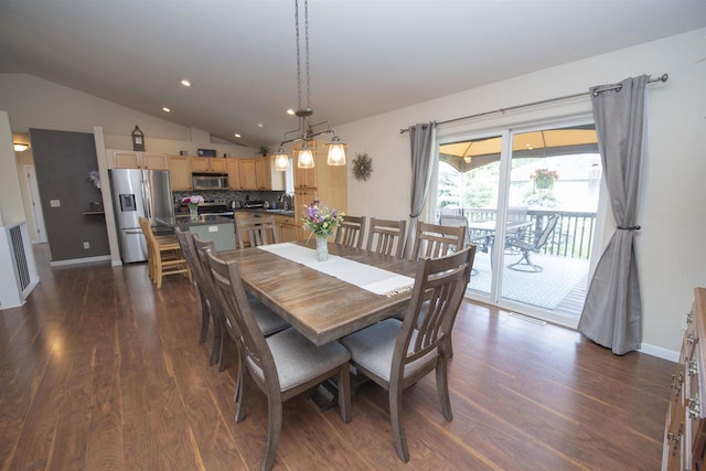 708 Owl Ln, Stevens Point, WI 54482 - dining area with lofted ceiling, dark wood finished floors, and recessed lighting