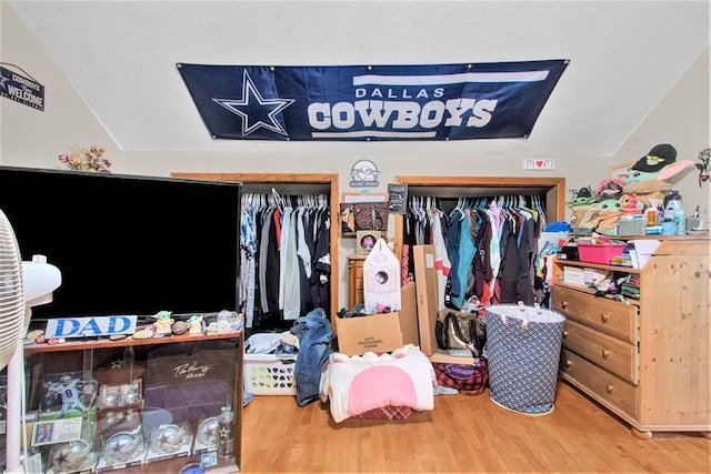 1208 Wisconsin St, Stevens Point, WI 54481 - bedroom with wood finished floors and two closets