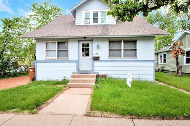1208 Wisconsin St, Stevens Point, WI 54481 - bungalow featuring roof with shingles