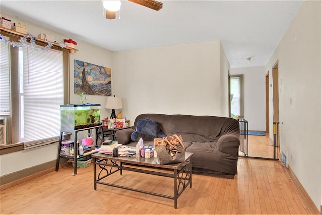 1208 Wisconsin St, Stevens Point, WI 54481 - living area with light wood-style floors and a ceiling fan