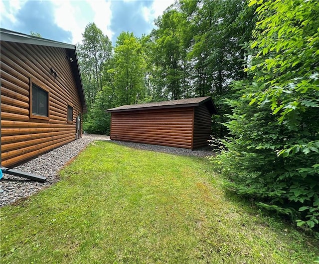 4686 W Butler Rd, Winter, WI 54896 - view of grassy yard with a storage unit