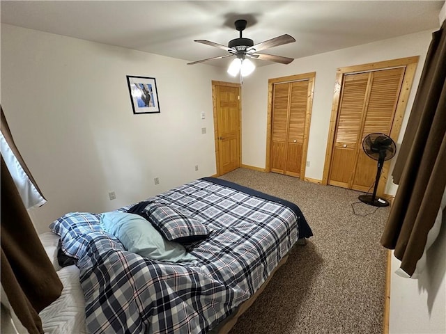 4686 W Butler Rd, Winter, WI 54896 - bedroom with multiple closets, carpet, and a ceiling fan