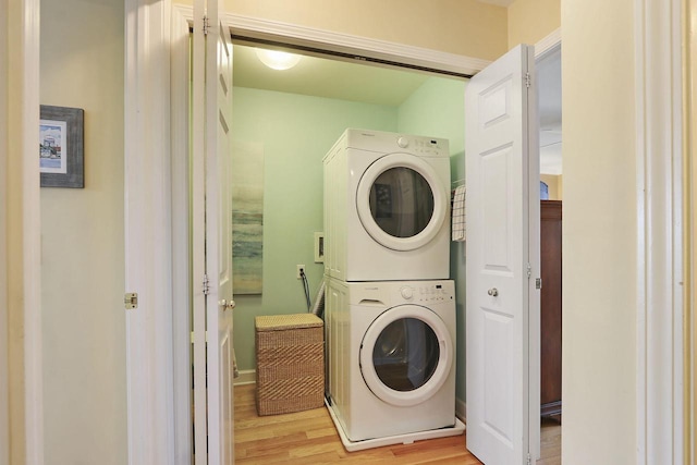 413 56th St, Kenosha, WI 53140 - washroom with estacked washer and dryer and light wood finished floors