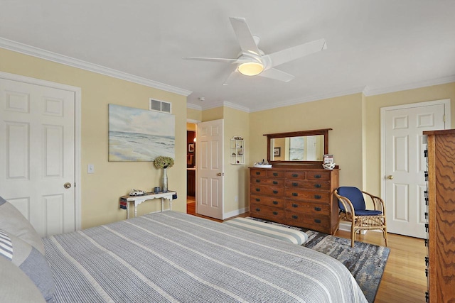 413 56th St, Kenosha, WI 53140 - bedroom featuring light wood finished floors, ornamental molding, and ceiling fan