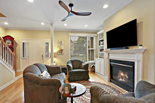 413 56th St, Kenosha, WI 53140 - living room featuring crown molding, light wood-type flooring, recessed lighting, stairs, and ceiling fan