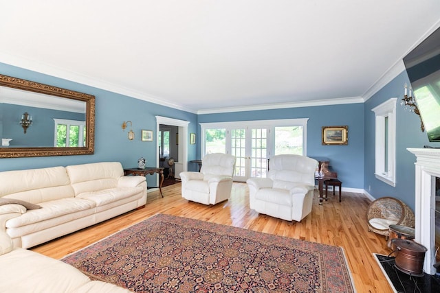 N2194 Valley Rd, La Crosse, WI 54601 - living area with wood finished floors, healthy amount of natural light, ornamental molding, and a fireplace