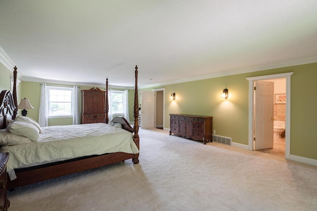 N2194 Valley Rd, La Crosse, WI 54601 - bedroom with ornamental molding, light colored carpet, and connected bathroom