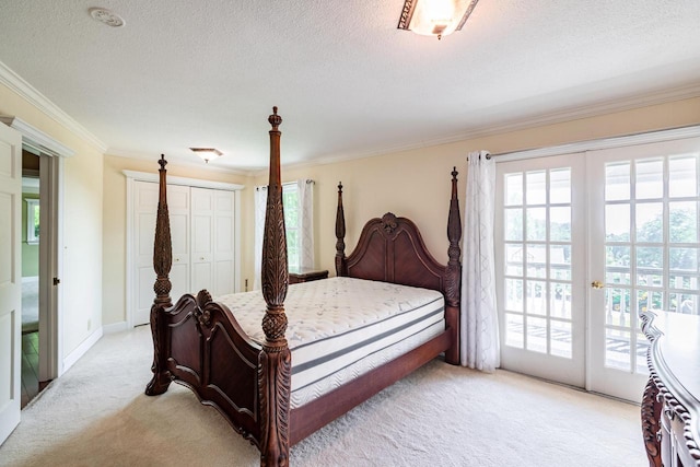 N2194 Valley Rd, La Crosse, WI 54601 - bedroom featuring access to outside, light carpet, multiple windows, ornamental molding, and french doors