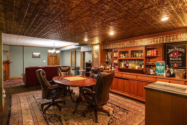 N2194 Valley Rd, La Crosse, WI 54601 - dining area featuring ornamental molding, a chandelier, wood finished floors, and an ornate ceiling