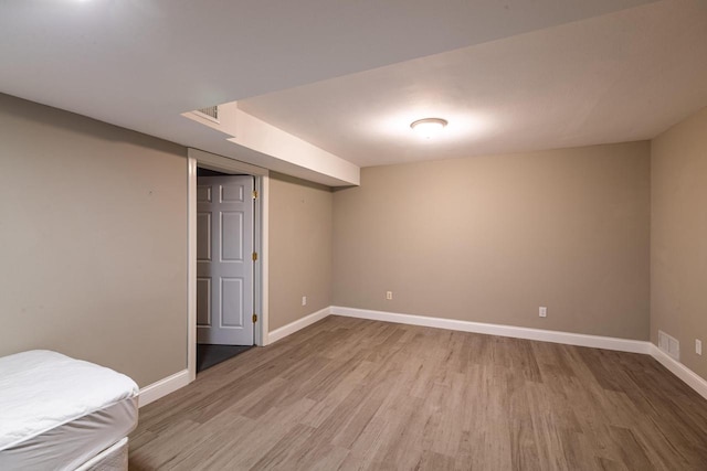 N2194 Valley Rd, La Crosse, WI 54601 - unfurnished bedroom featuring light wood-style flooring