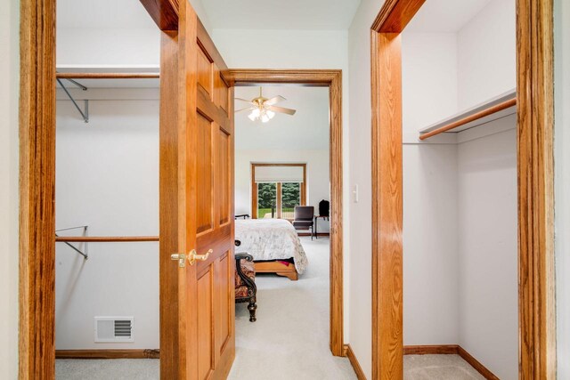 N65W38340 S Woodlake Cir, Oconomowoc, WI 53066 - hall featuring light colored carpet and baseboards