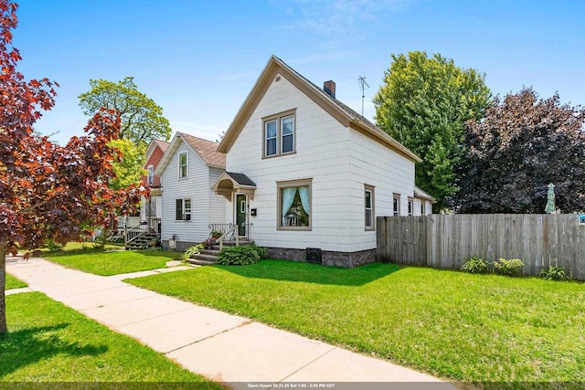 931 Carney Blvd, Marinette, WI 54143 - traditional-style home featuring a chimney