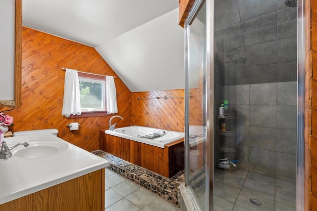 931 Carney Blvd, Marinette, WI 54143 - bathroom with wood walls, a bath, a shower stall, vaulted ceiling, and tile patterned flooring
