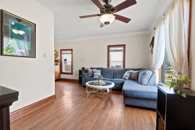 931 Carney Blvd, Marinette, WI 54143 - living room with plenty of natural light, ornamental molding, light wood-style floors, and ceiling fan