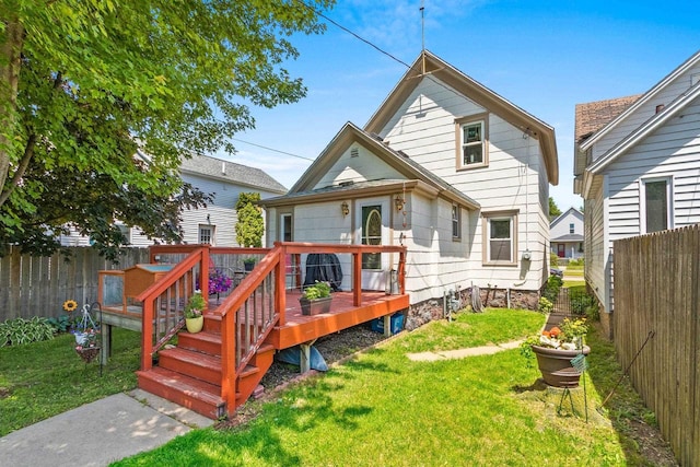 931 Carney Blvd, Marinette, WI 54143 - back of property featuring a wooden deck and a fenced backyard