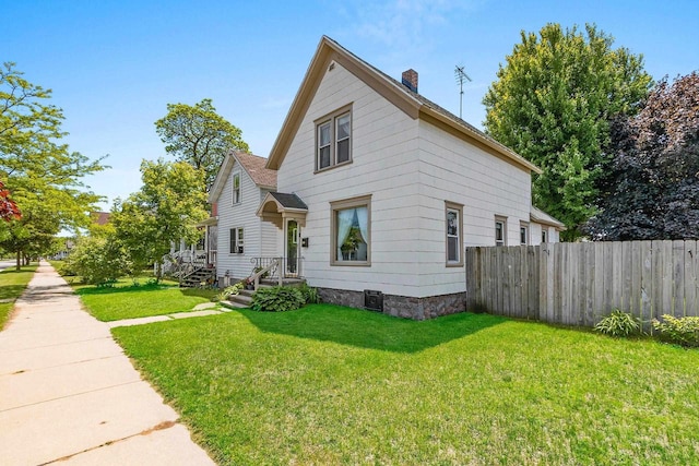 931 Carney Blvd, Marinette, WI 54143 - traditional home featuring a chimney