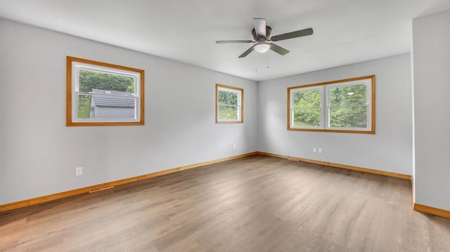 N3923 Sunny Slope Ave, Cascade, WI 53011 - spare room featuring wood finished floors and ceiling fan