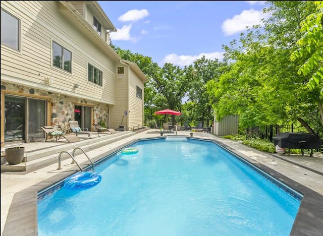 205 Kummrow Ct, Wales, WI 53183 - view of swimming pool with a patio